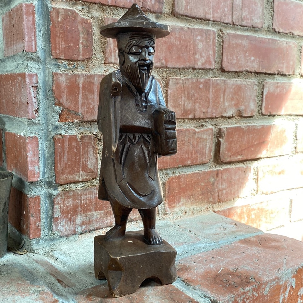 Vintage hand carved wooden happy bearded Asian sculpture